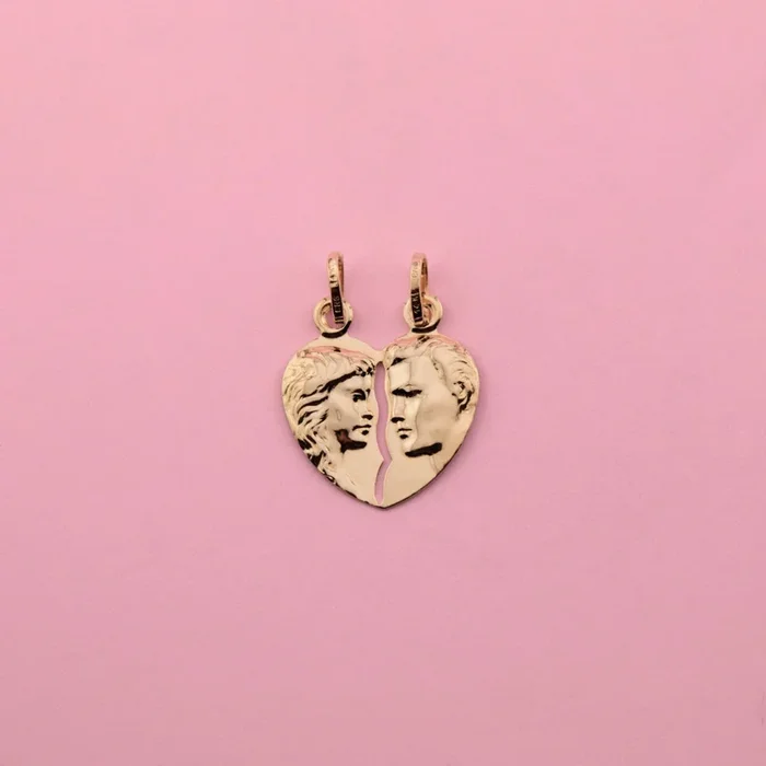 Man and Woman Breakable Heart Pendant