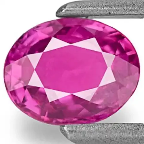 Mozambique Ruby, 0.76 Carats, Intense Pinkish Purple Oval