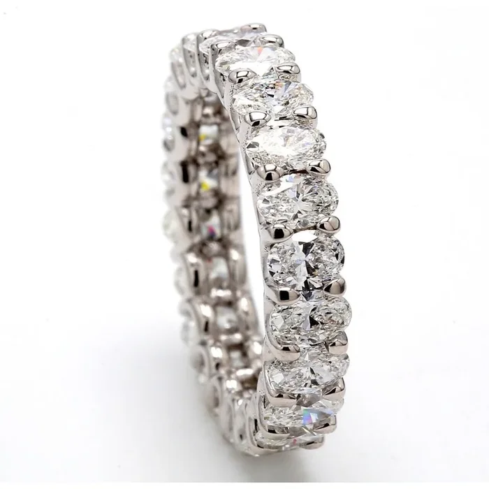 Ninacci Platinum Eternity Band with 3.11 Carats Oval Diamonds – Size 5.0