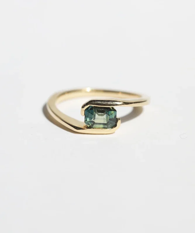 Orbit Ring with Emerald Cut Sapphire