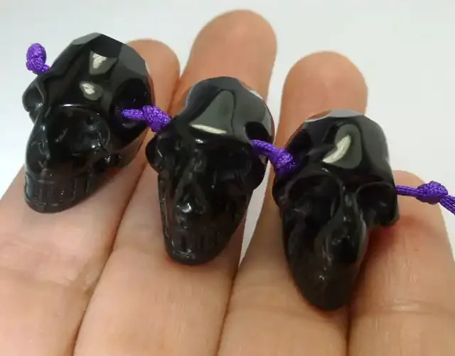 PARCEL OF 3 FACETED BLACK OBSIDIAN SKULL 105.85 CTS RT 1885