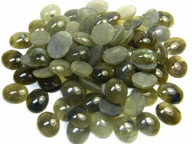 PARECL CABOCHON 12 X10 MM QUARTZ,262 CARATS AG 1781
