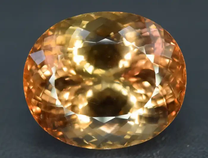 S 31-82 , 37.65 Carats Oval Cut Champagne Color Topaz