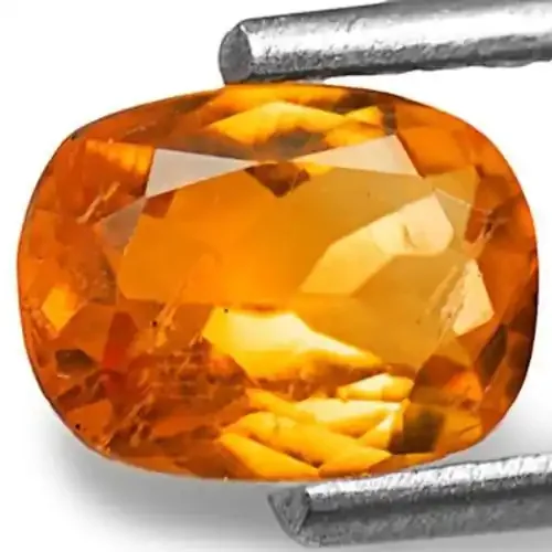 Tanzania Clinohumite, 0.82 Carats, Vivid Orange Oval
