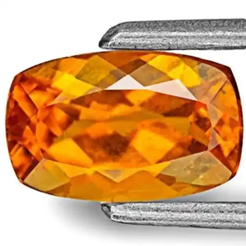 Tanzania Clinohumite, 0.98 Carats, Deep Yellowish Orange Cushion