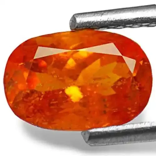 Tanzania Clinohumite, 1.06 Carats, Dark Orange Oval