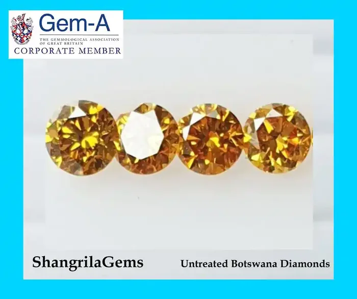 Two 2mm Orange Diamond brilliant cut diamonds grade SI1 0.03ct Total 0.06ct