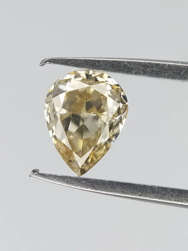 Yellow Natural Diamond , Pear Brilliant Cut 0.20 cts